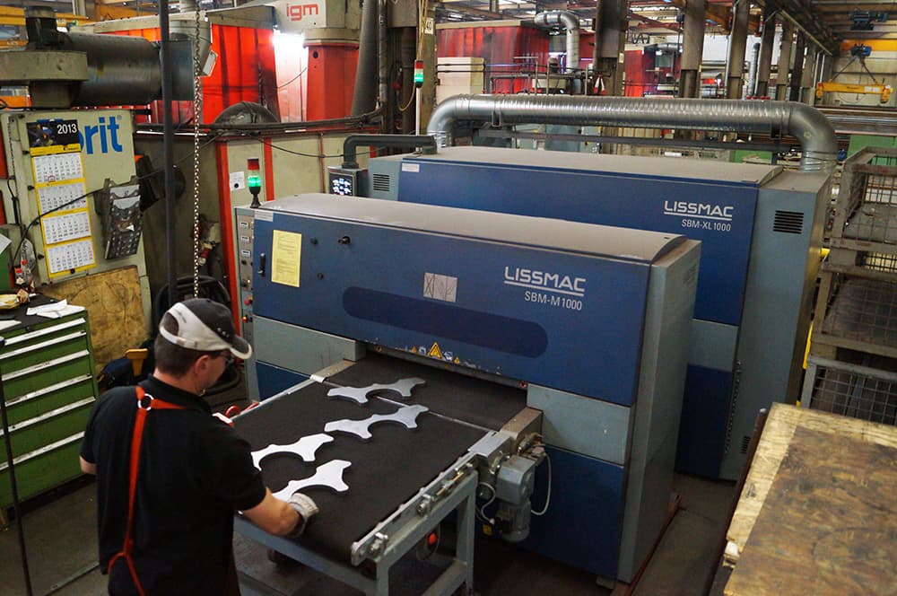 LISSMAC conveyor belt and roller conveyor for sheet metal parts transport